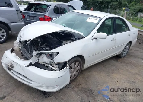 2003 Toyota Camry Le z USA, uszkodzony, nr VIN 4T1BE32KX3U223732